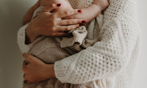 woman holding a baby