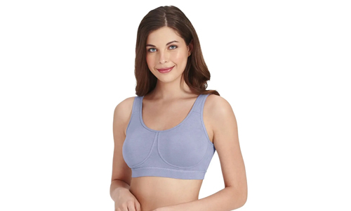 A woman wearing a comfortable cami bra which is made from soft, breathable material, perfect for active lifestyles and workouts.