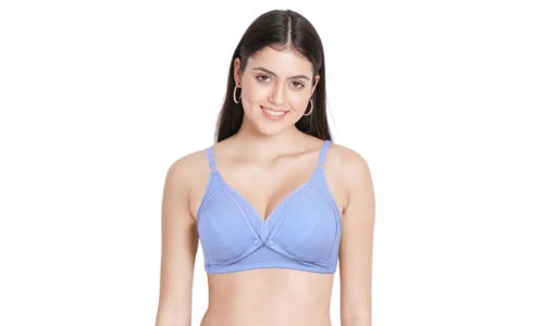 A woman wearing a comfortable nursing bra